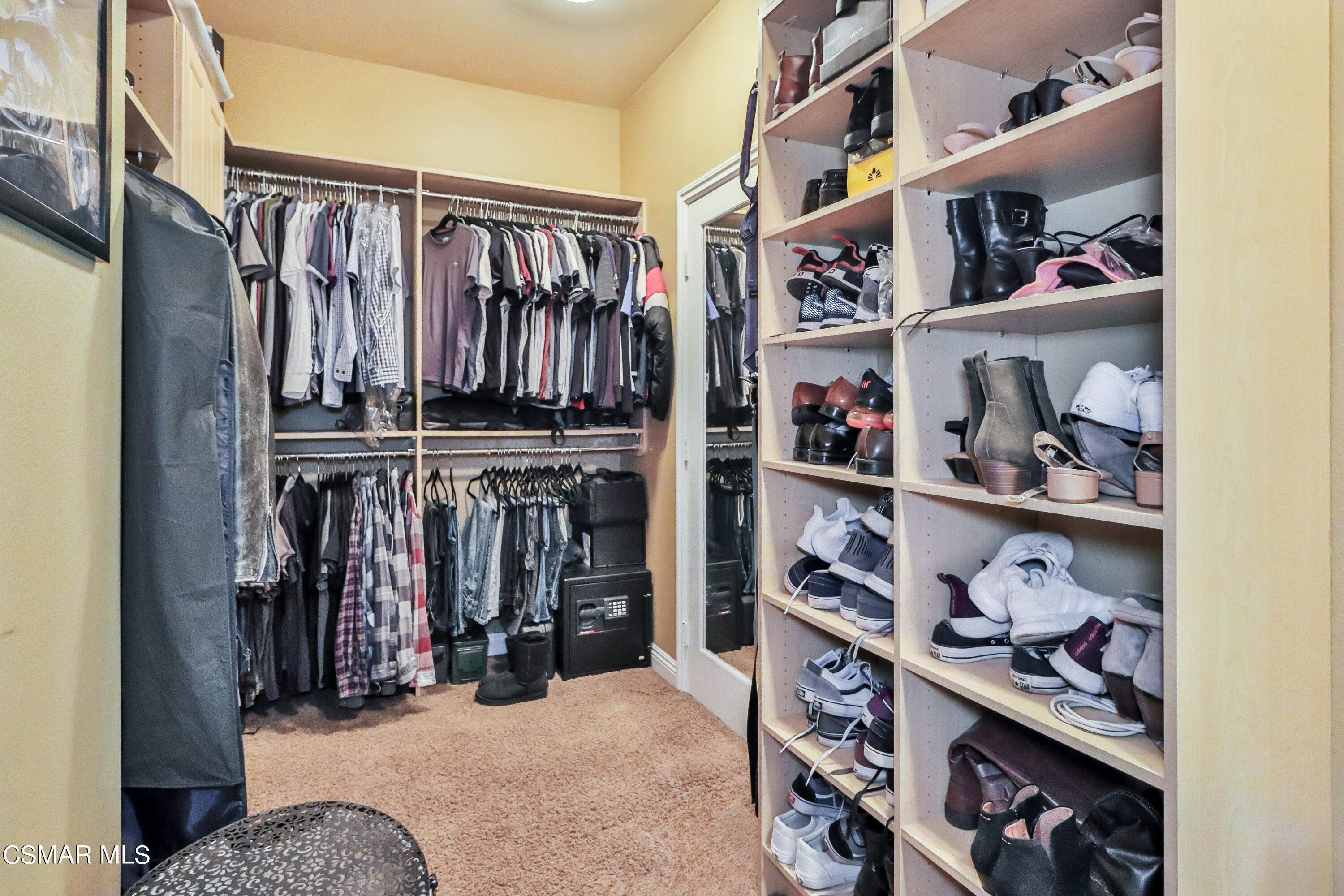 4025 Eagle Flight Drive Simi Valley, CA 93065 - Photo 45 of 60 a view of walk in closet with clothes and shoes