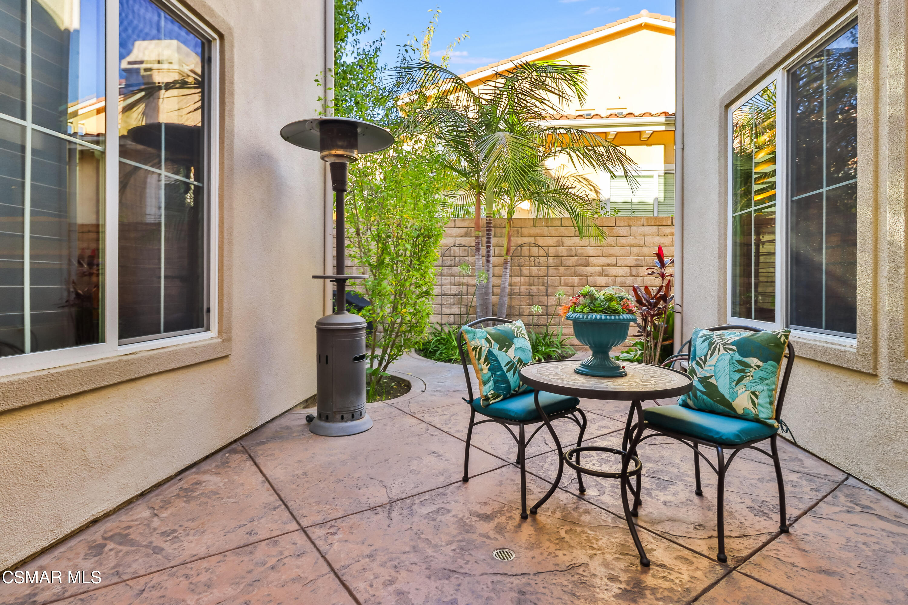 4025 Eagle Flight Drive Simi Valley, CA 93065 - Photo 46 of 60 a view of a porch with furniture and floor to ceiling window