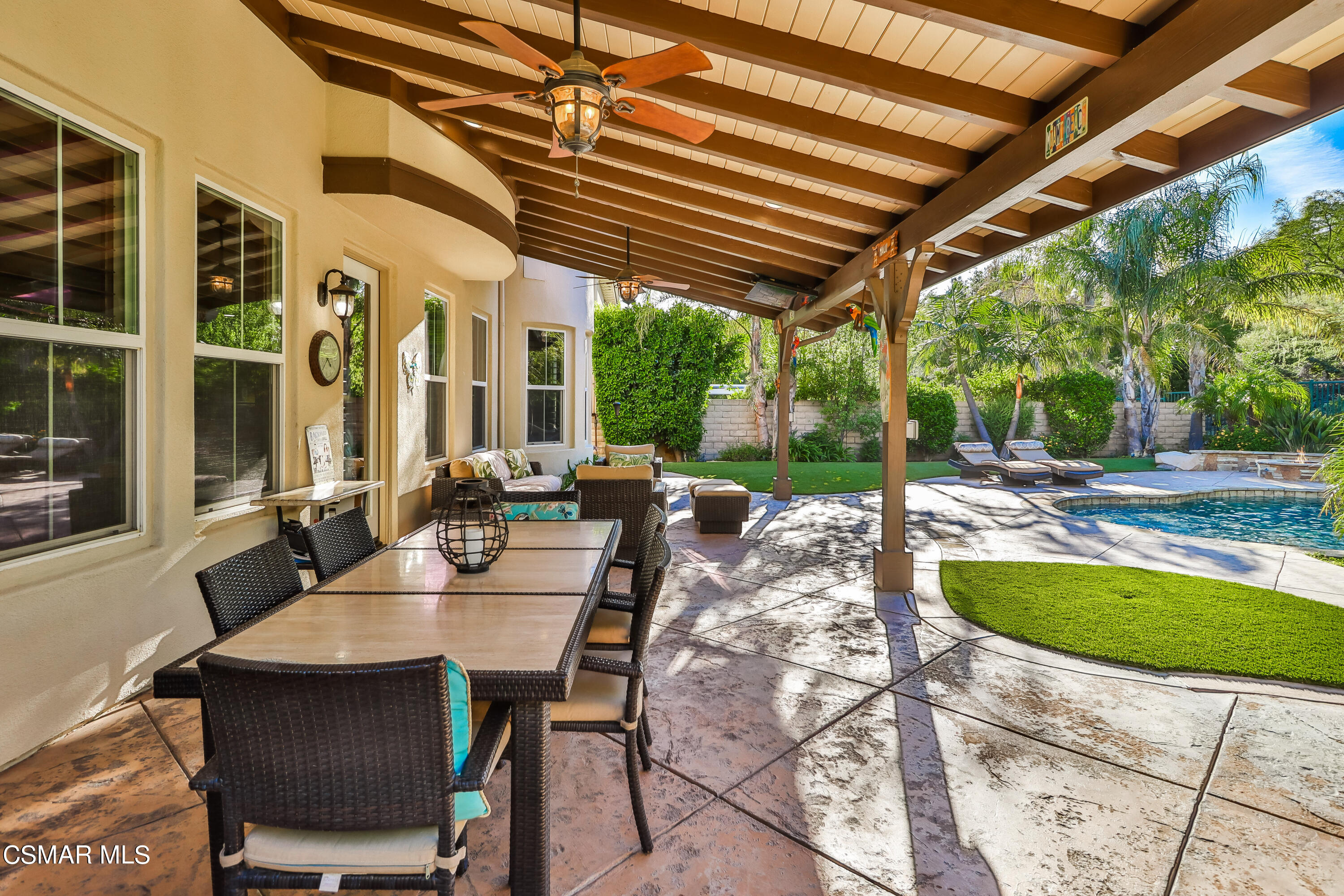 4025 Eagle Flight Drive Simi Valley, CA 93065 - Photo 58 of 60 a view of a patio with a table and chairs and potted plants