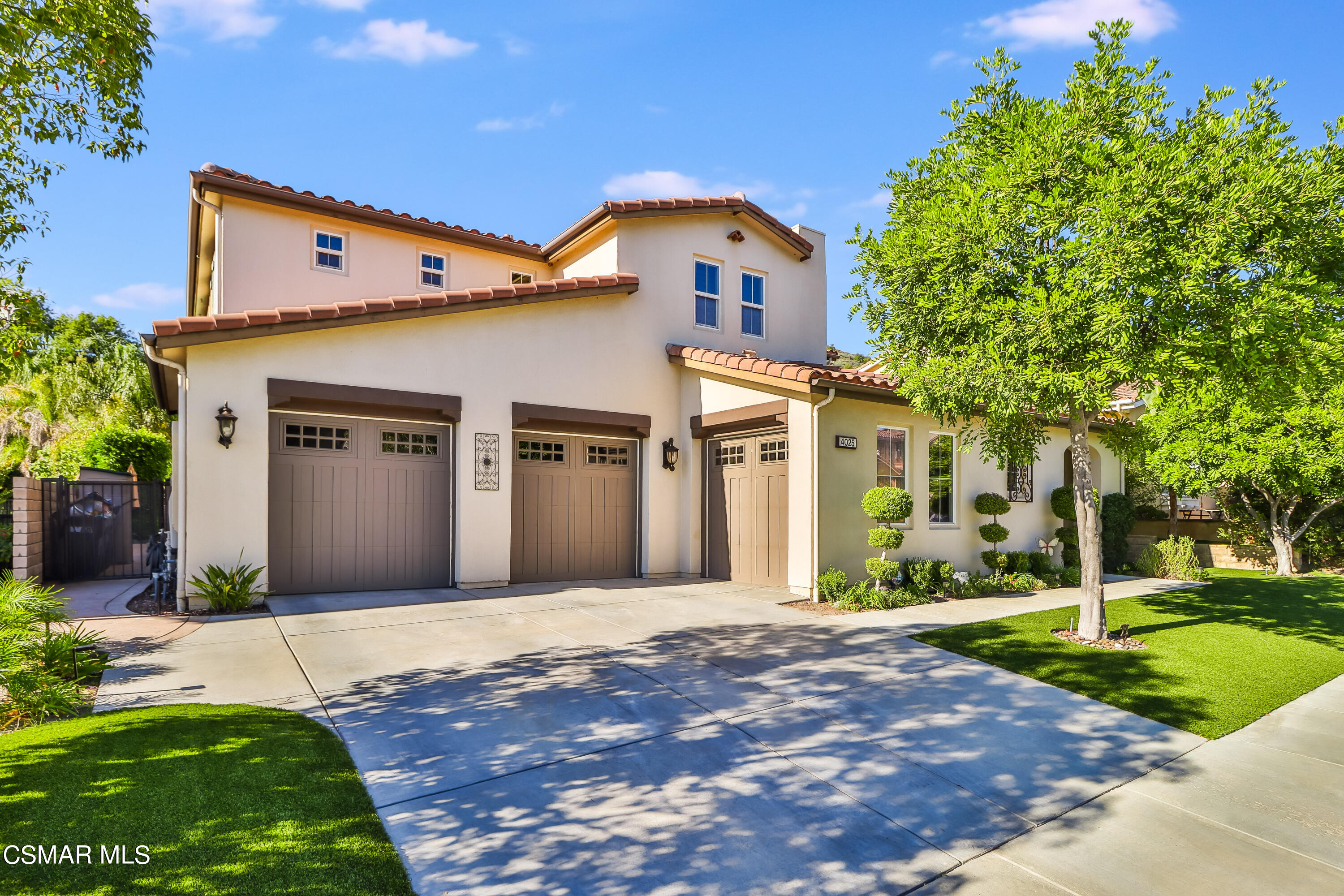 4025 Eagle Flight Drive Simi Valley, CA 93065 - Photo 60 of 60 a front view of a house with a yard and garage