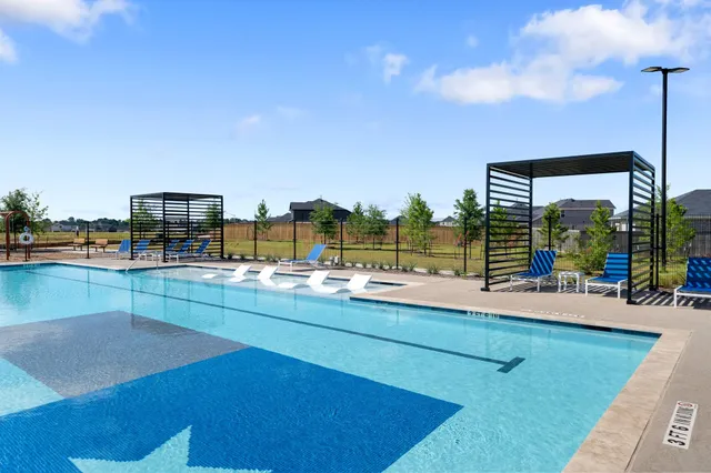 a view of a kitchen with swimming pool and outdoor space
