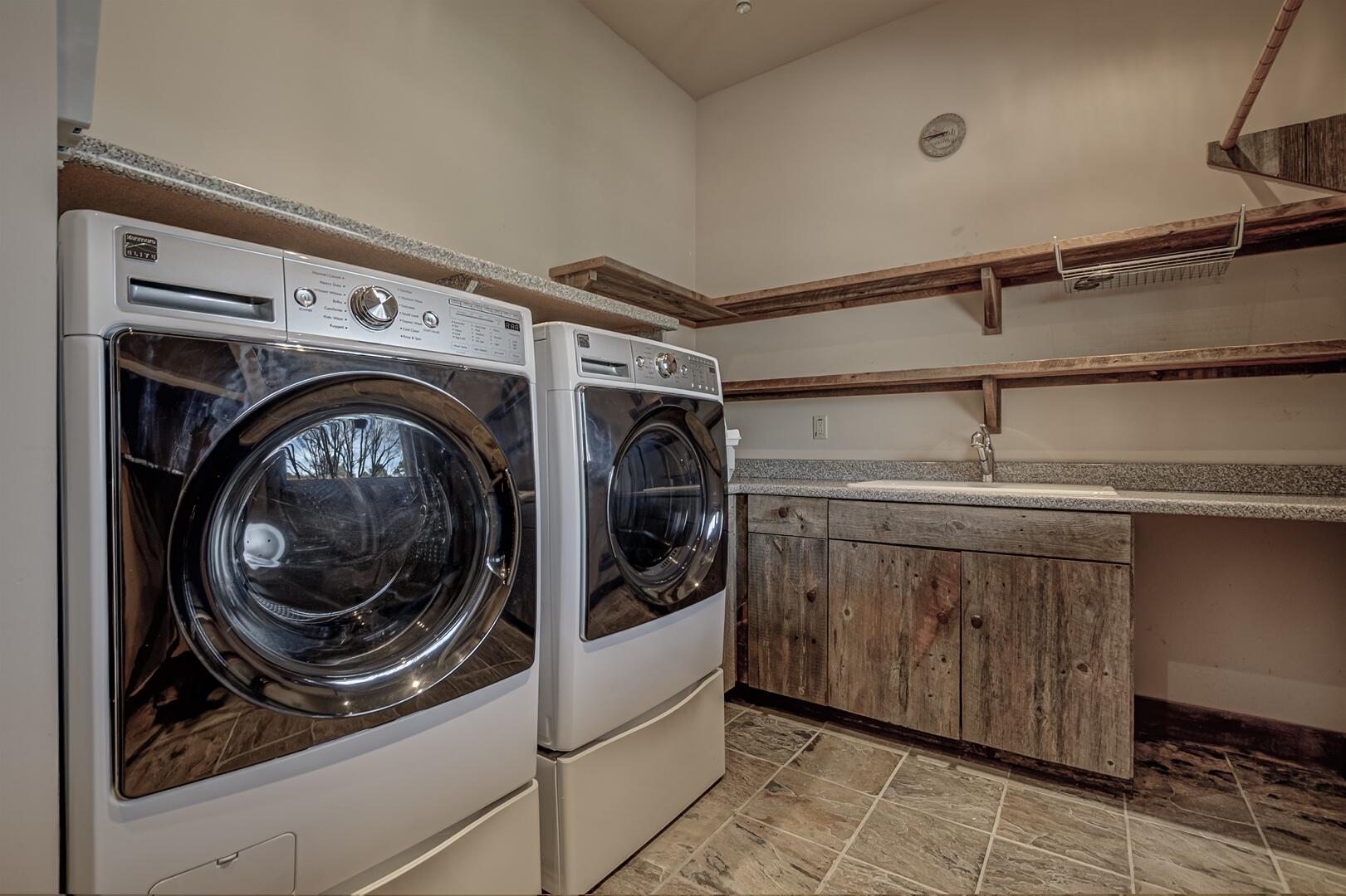 2401 East Rim Club Drive Payson, AZ 85541 - Photo 32 of 116 Spacious laundry room with storage and utility sink