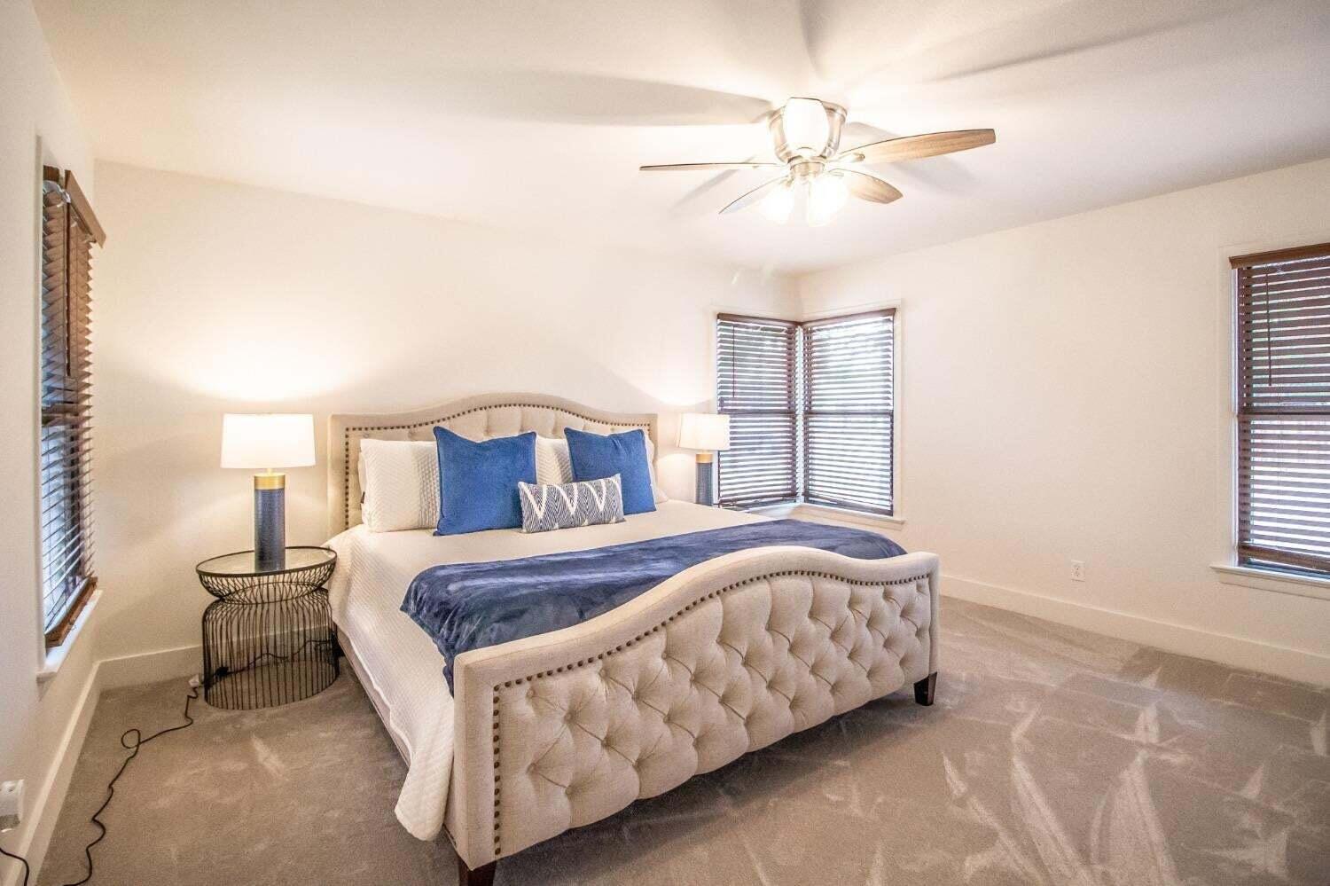 3501 33rd Street Lubbock, TX 79410 - Photo 14 of 34 a bedroom with a bed and window