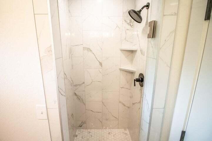 3501 33rd Street Lubbock, TX 79410 - Photo 18 of 34 a bathroom with a shower