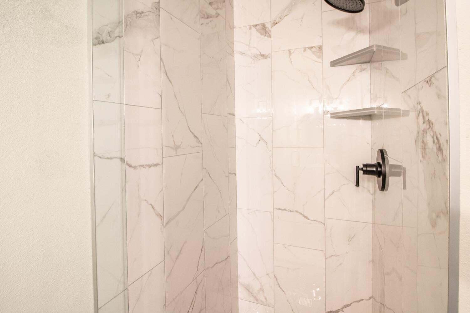 3501 33rd Street Lubbock, TX 79410 - Photo 32 of 34 a bathroom with a shower