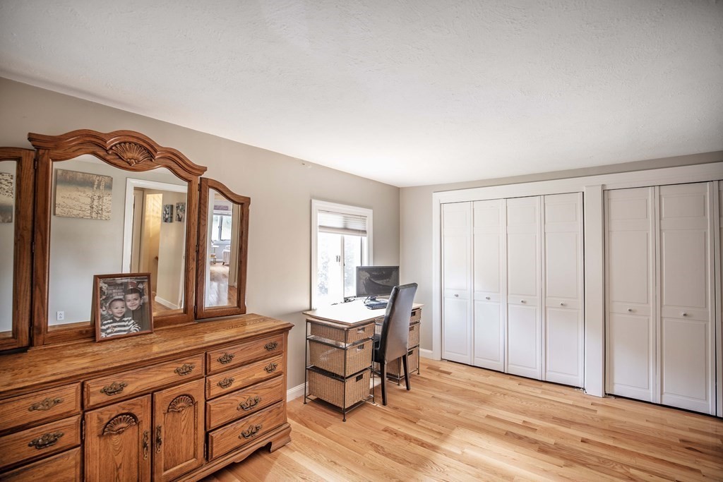 96 Wyman Road Billerica, MA 01821 - Photo 28 of 35 a view of a room with furniture and windows