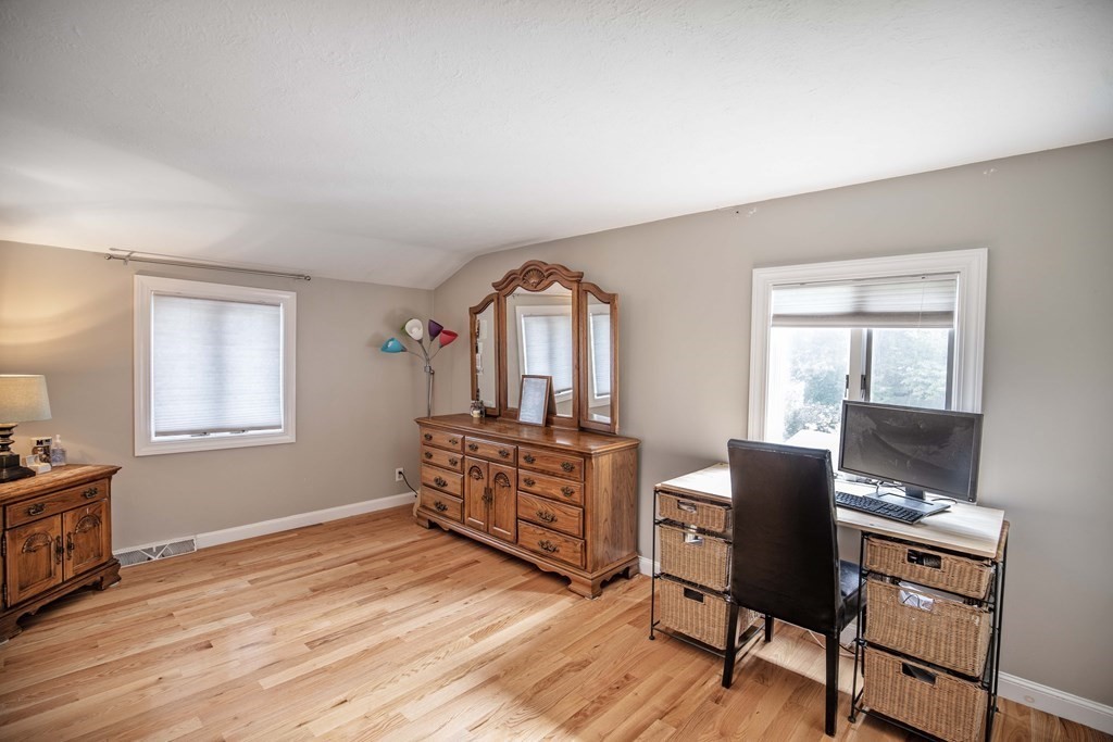 96 Wyman Road Billerica, MA 01821 - Photo 29 of 35 a view of a workspace with furniture and a window