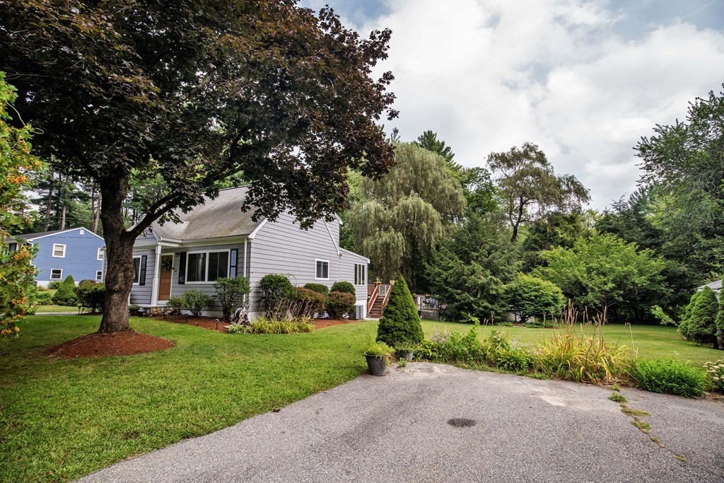 96 Wyman Road Billerica, MA 01821 - Photo 3 of 35 a front view of house with yard and green space