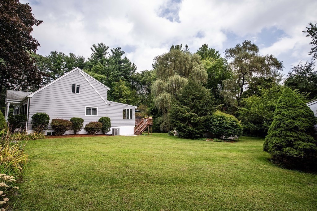 96 Wyman Road Billerica, MA 01821 - Photo 32 of 35 a view of a house with a yard