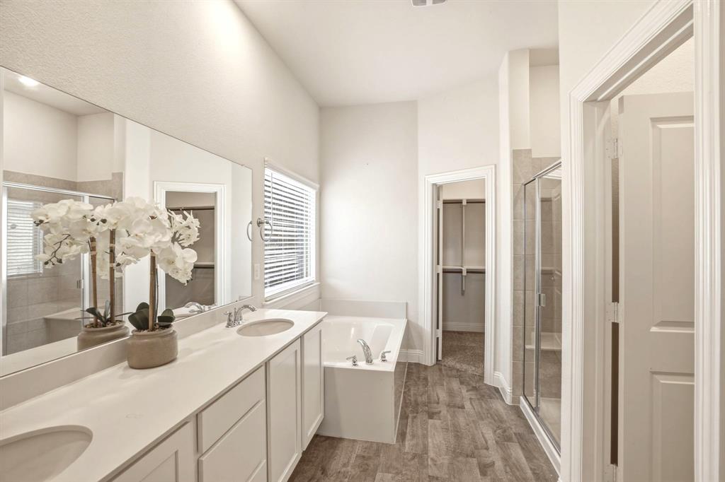 2909 Faro Road Aubrey, TX 76227 - Photo 14 of 32 a bathroom with a sink double vanity