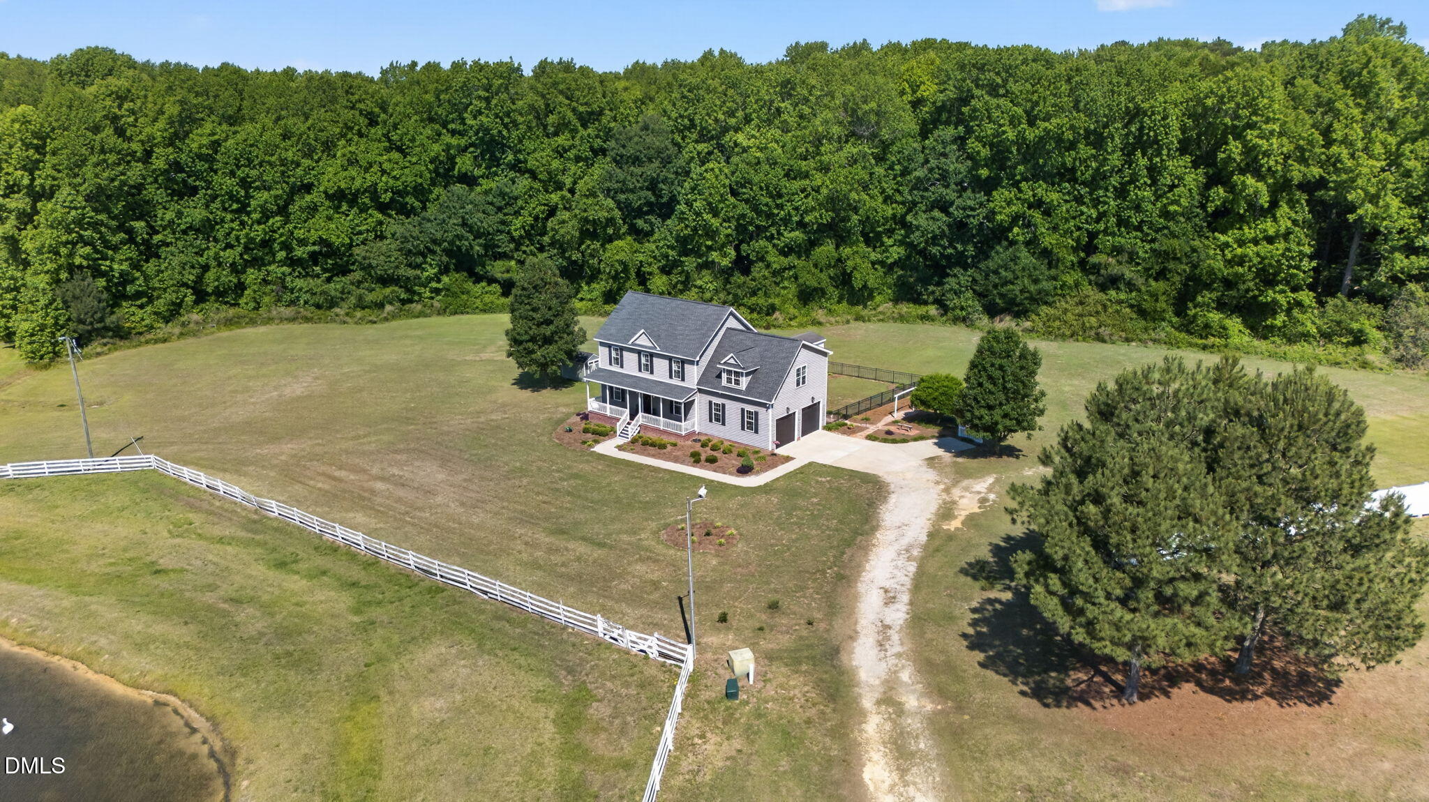 923 White Memorial Church Road Willow Spring, NC 27592 - Photo 42 of 46 a view of a swimming pool with a yard