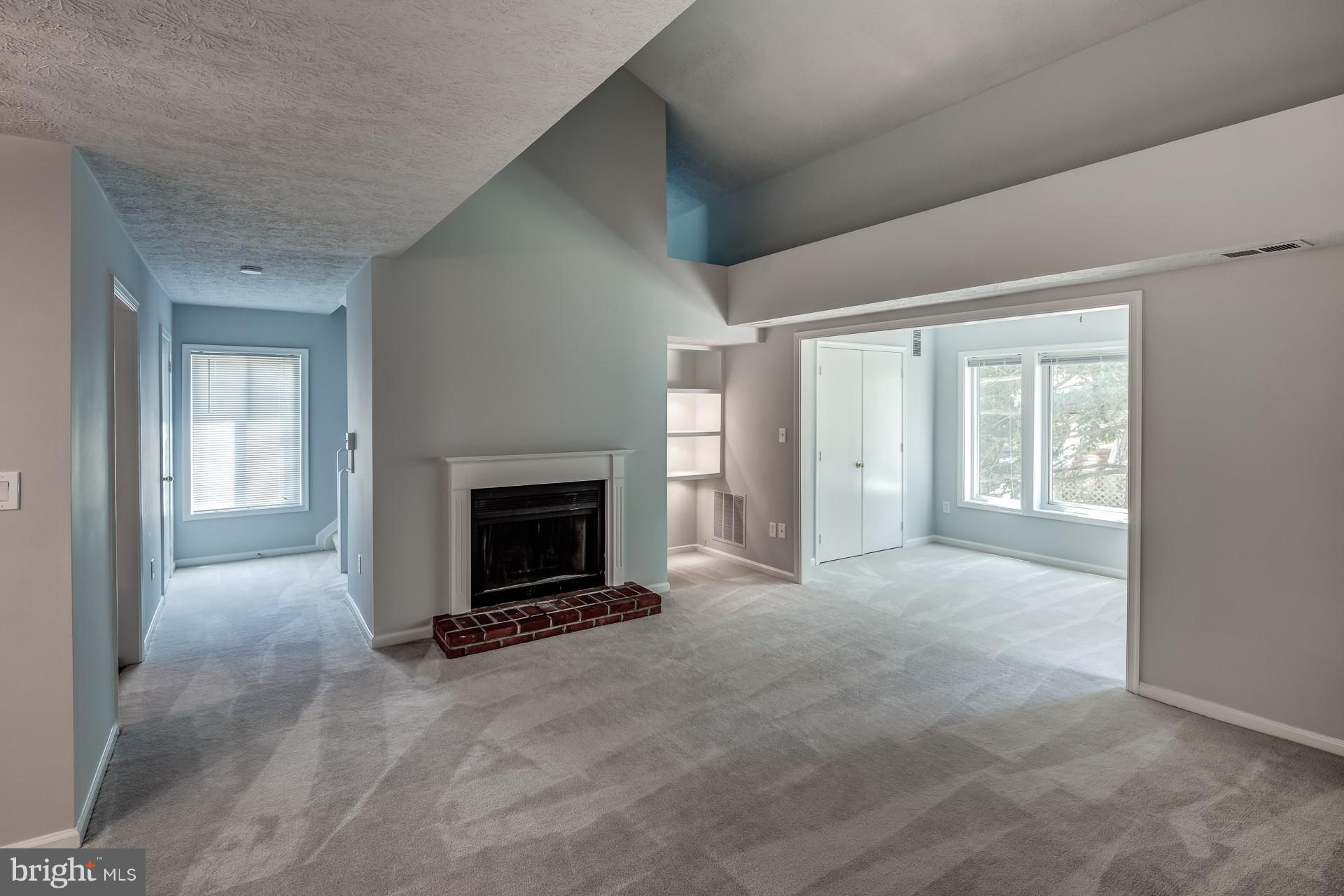2283 Hunter's Run Drive, Unit 2283 Reston, VA 20191 - Photo 6 of 23 Living Room: Soaring Ceilings