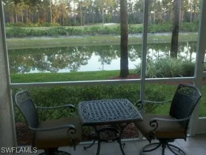 a view of a wooden deck and a patio