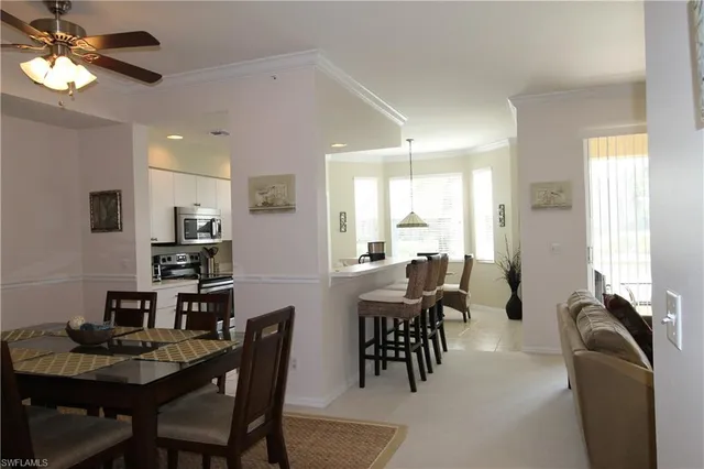 a view of a dining room with furniture