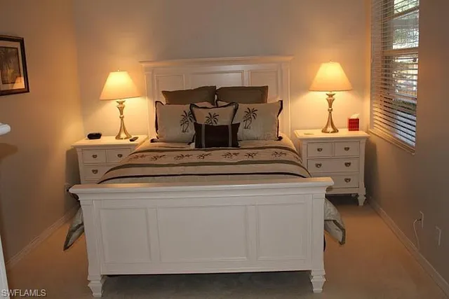 a view of living room with furniture and lamp