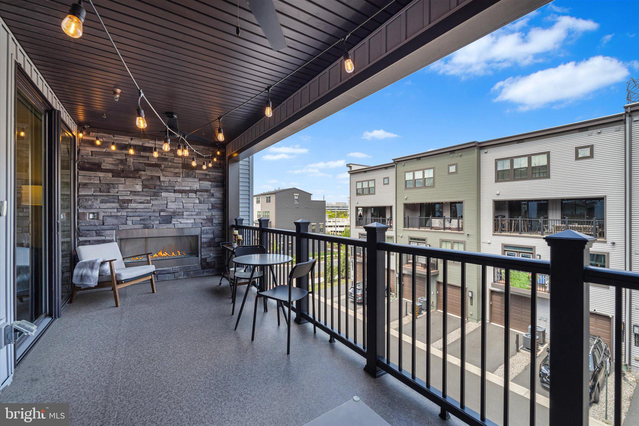 12915 Sunrise Ridge Alley, Unit 74 Herndon, VA 20171 - Photo 19 of 48 a view of living room with balcony