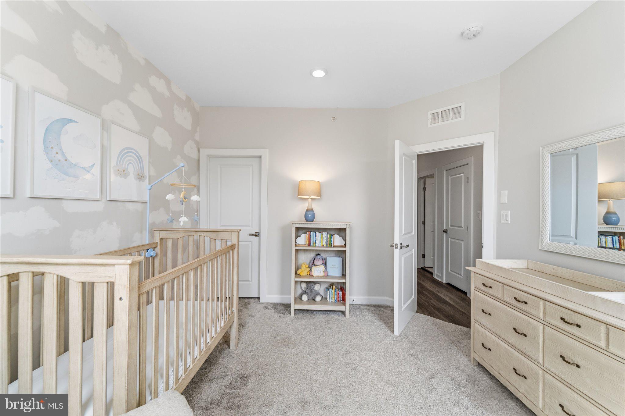 12915 Sunrise Ridge Alley, Unit 74 Herndon, VA 20171 - Photo 31 of 48 a view of an empty room and window