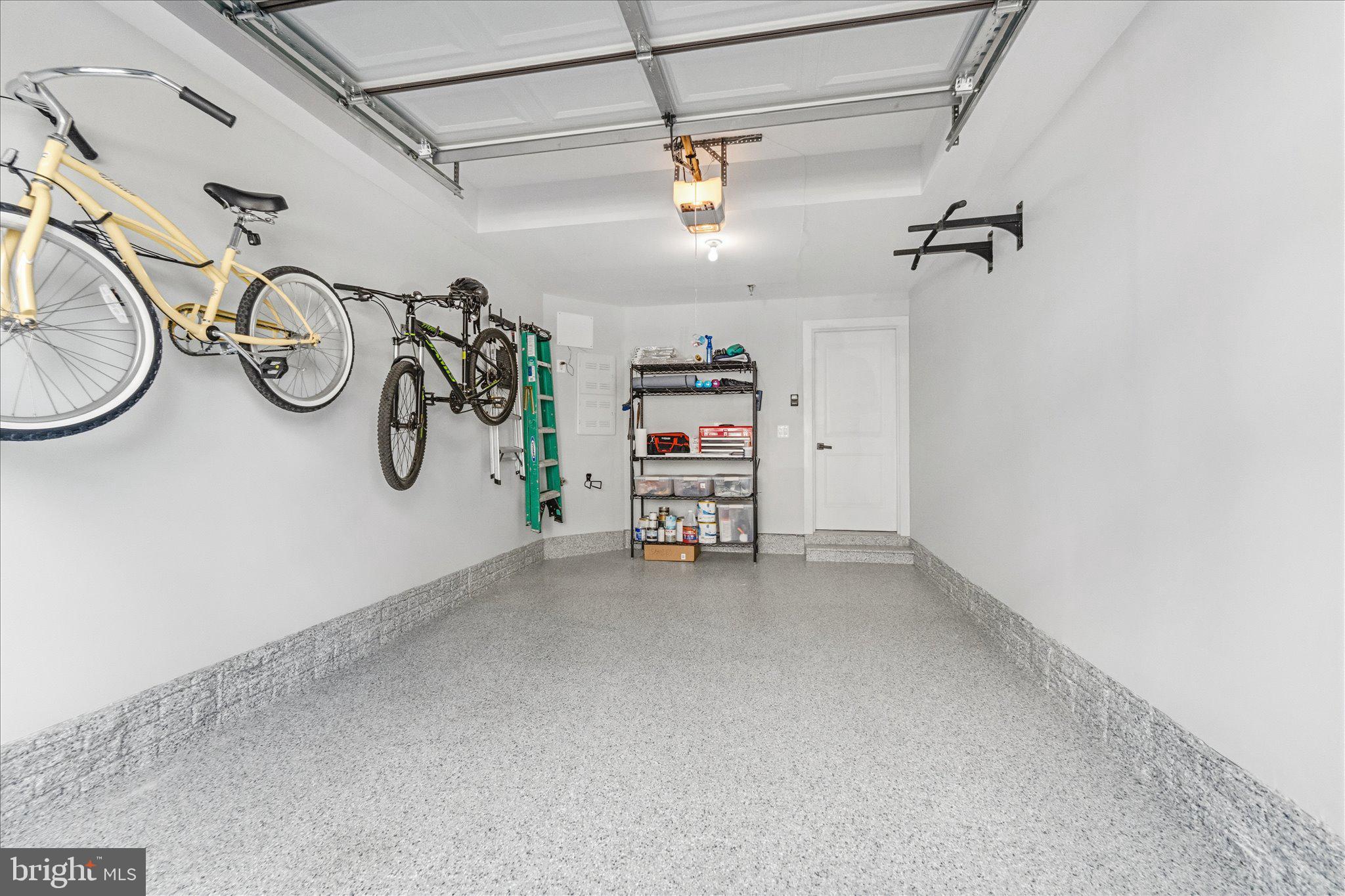 12915 Sunrise Ridge Alley, Unit 74 Herndon, VA 20171 - Photo 32 of 48 a view of a storage & utility room with racks on the wall