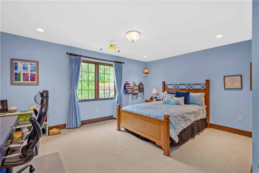776 Valleyview Road Pittsburgh, PA 15243 - Photo 15 of 25 a spacious bedroom with a bed and a window
