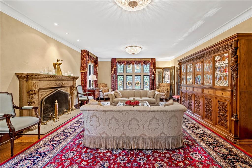 776 Valleyview Road Pittsburgh, PA 15243 - Photo 5 of 25 a living room with furniture fireplace and a large window