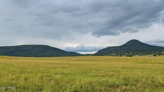 a view of ocean and mountain