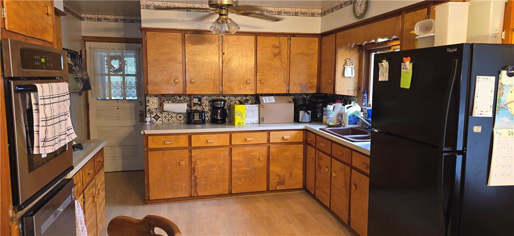 17895 Rte 119 Highway North Punxsutawney, PA 15767 - Photo 5 of 15 a kitchen with stainless steel appliances granite countertop a refrigerator and a sink