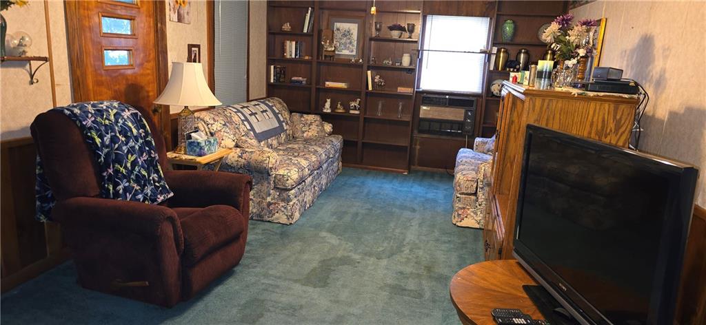 17895 Rte 119 Highway North Punxsutawney, PA 15767 - Photo 6 of 15 a living room with furniture fireplace and a window
