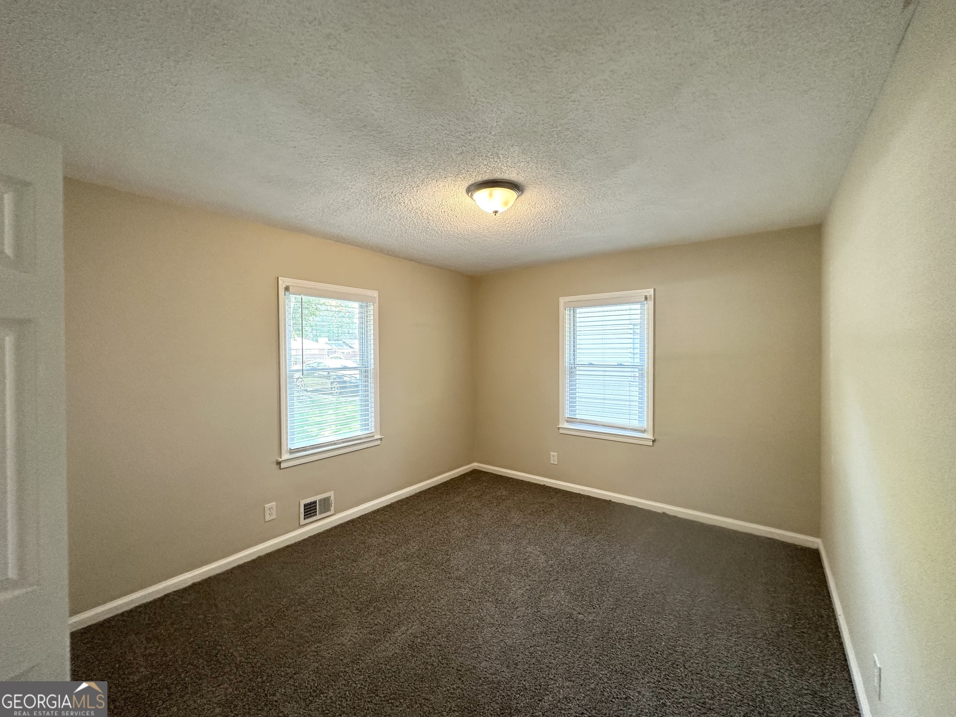 1089 Canal Street Decatur, GA 30032 - Photo 14 of 18 an empty room with a window