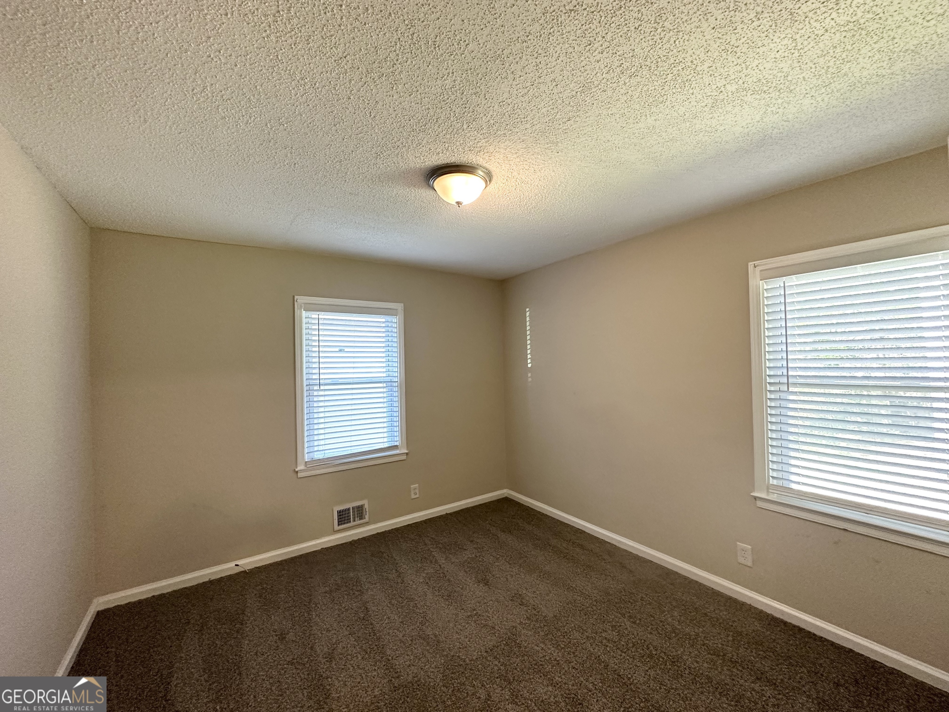 1089 Canal Street Decatur, GA 30032 - Photo 16 of 18 an empty room with a window