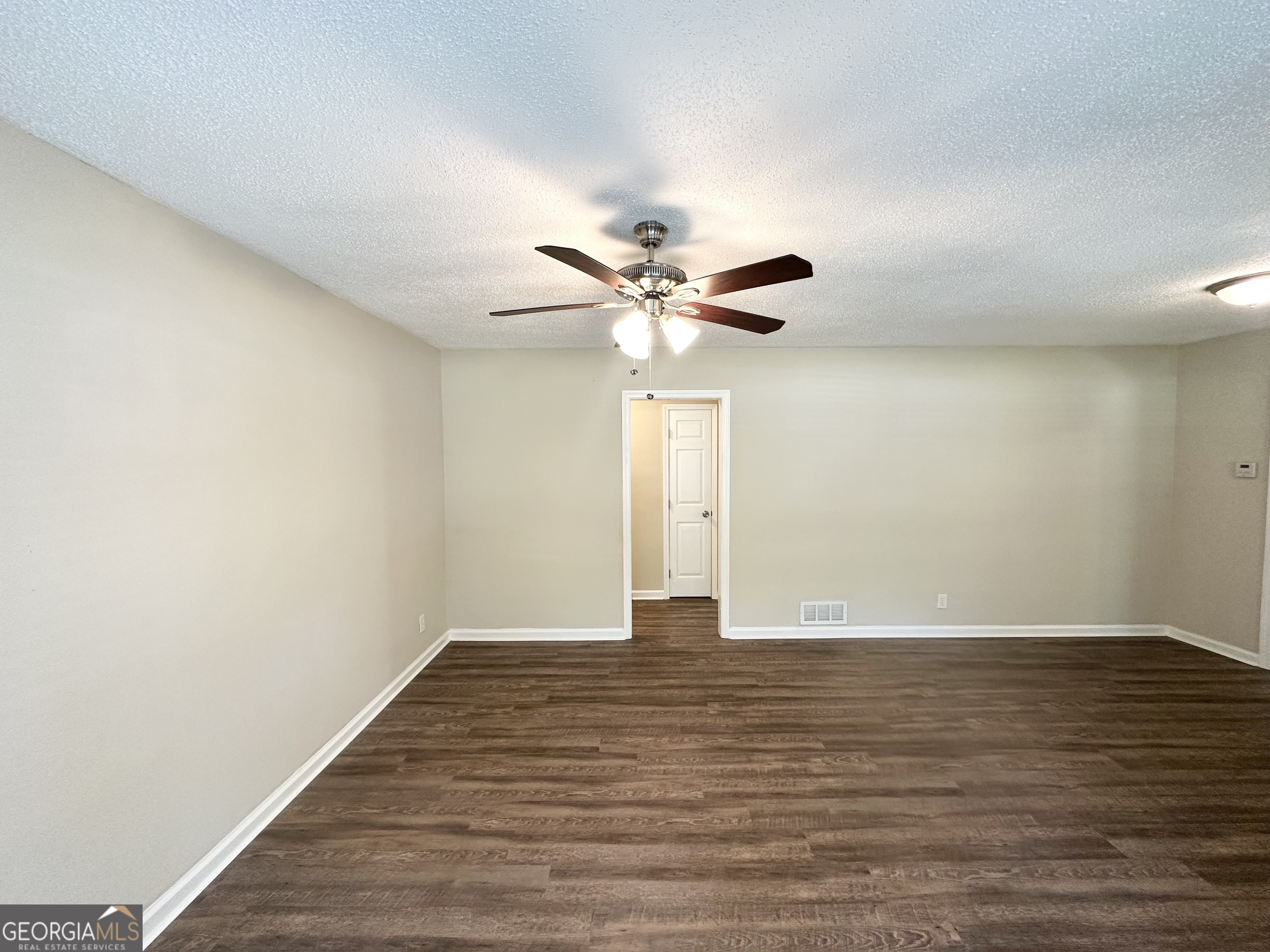 1089 Canal Street Decatur, GA 30032 - Photo 2 of 18 a view of an empty room with wooden floor