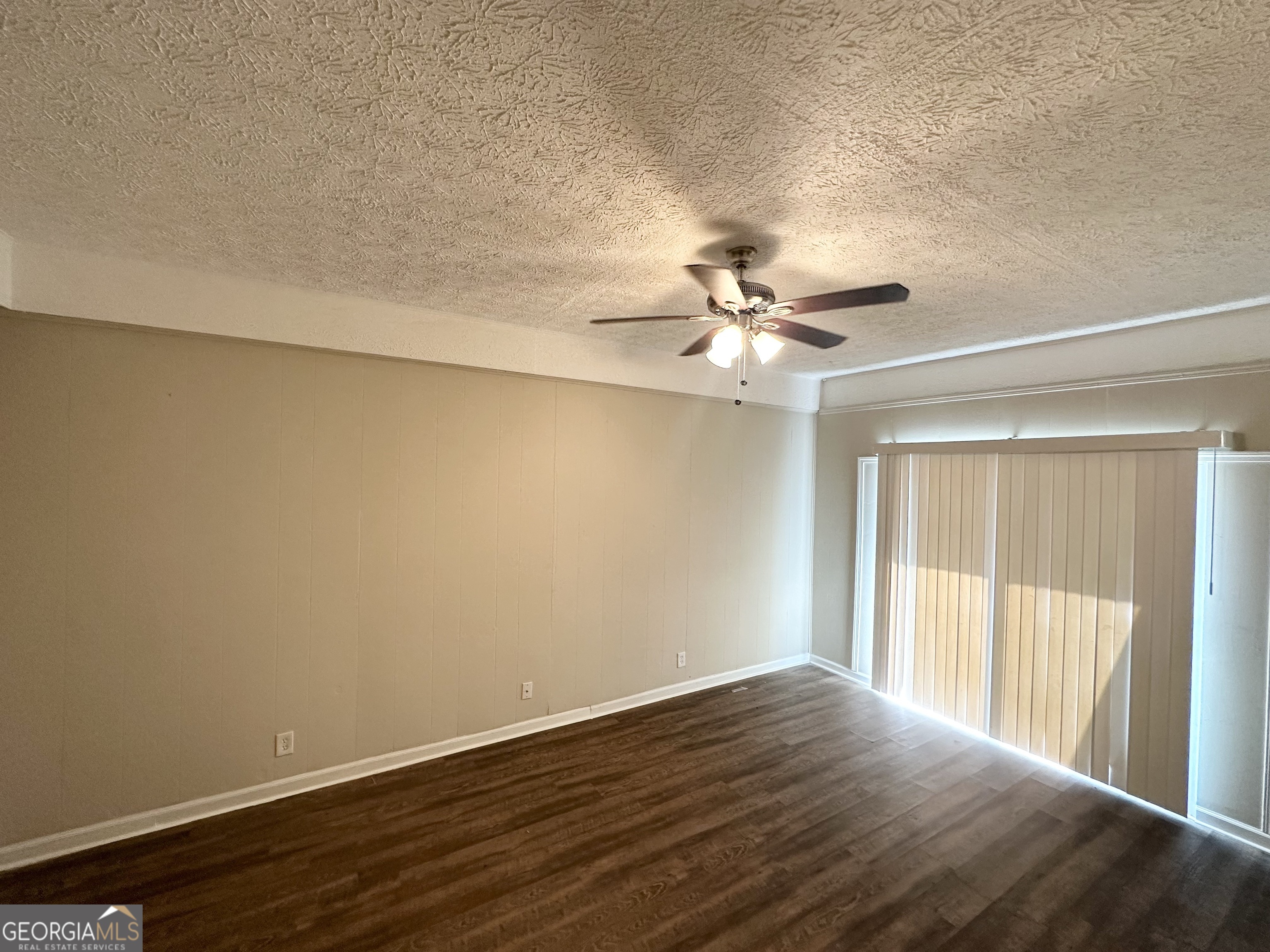 1089 Canal Street Decatur, GA 30032 - Photo 8 of 18 a view of an empty room with wooden floor and a window