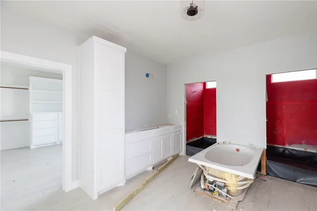 a room with furniture and a window