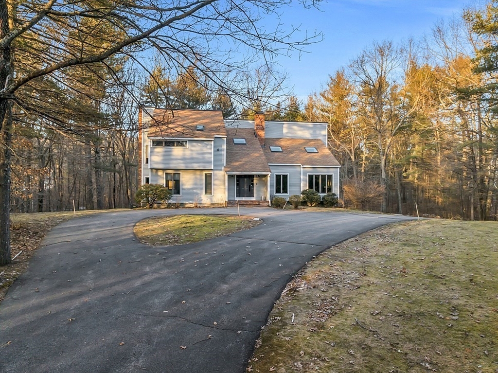 80 Elizabeth Ridge Road Carlisle, MA 01741 - Photo 3 of 33 a view of house with yard