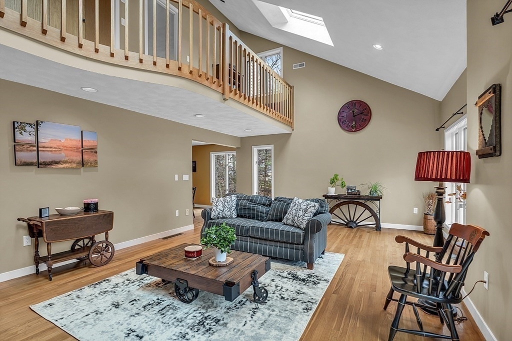 80 Elizabeth Ridge Road Carlisle, MA 01741 - Photo 8 of 33 a living room with furniture and a rug