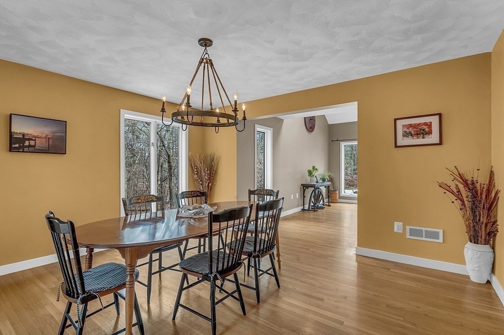 80 Elizabeth Ridge Road Carlisle, MA 01741 - Photo 9 of 33 a dining room with furniture and window