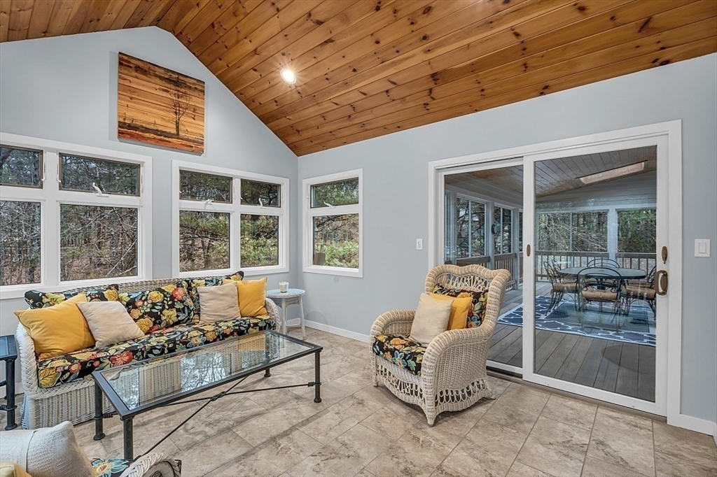 80 Elizabeth Ridge Road Carlisle, MA 01741 - Photo 10 of 33 a balcony with furniture and outdoor seating