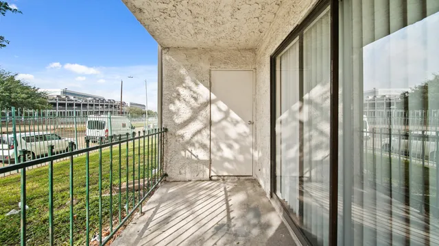a view of a balcony with city view