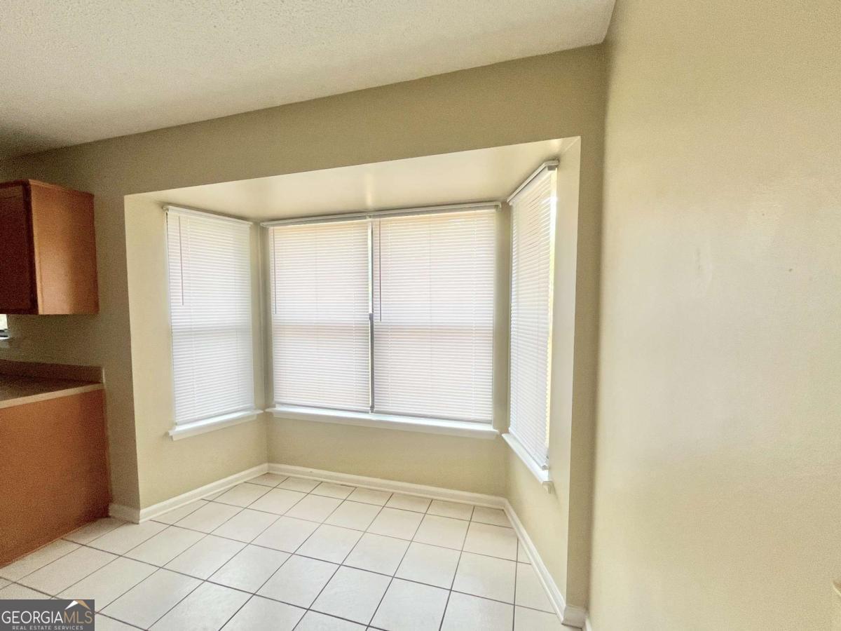 317 Lake View Drive Kingsland, GA 31548 - Photo 14 of 51 a view of an empty room with a window