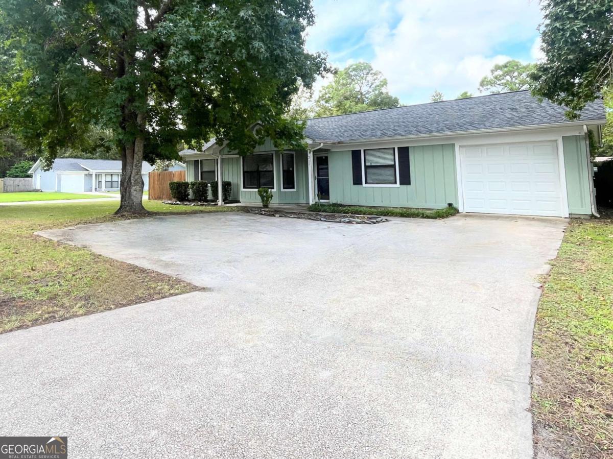 317 Lake View Drive Kingsland, GA 31548 - Photo 2 of 51 front view of a house with a yard