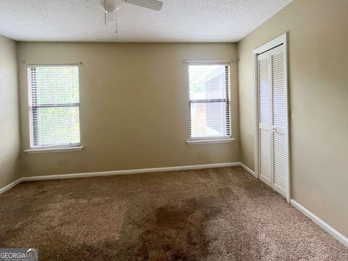 317 Lake View Drive Kingsland, GA 31548 - Photo 24 of 51 an empty room with windows