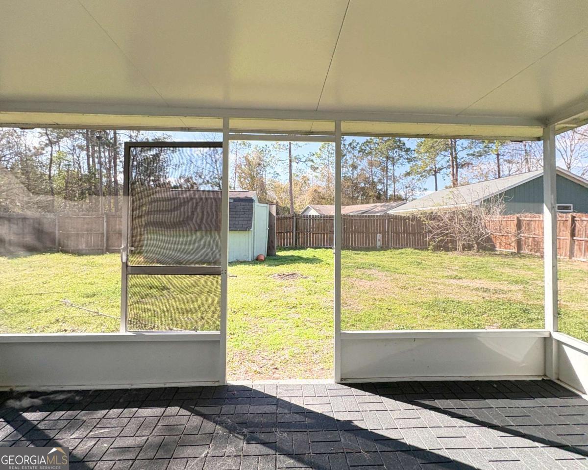 317 Lake View Drive Kingsland, GA 31548 - Photo 31 of 51 a view of a room with large windows