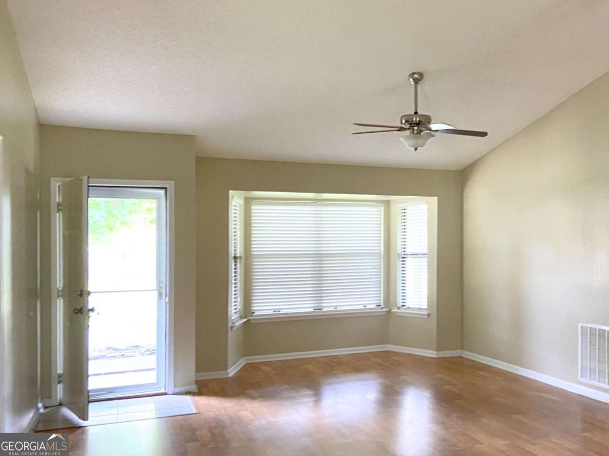 317 Lake View Drive Kingsland, GA 31548 - Photo 8 of 51 a view of an empty room with a window