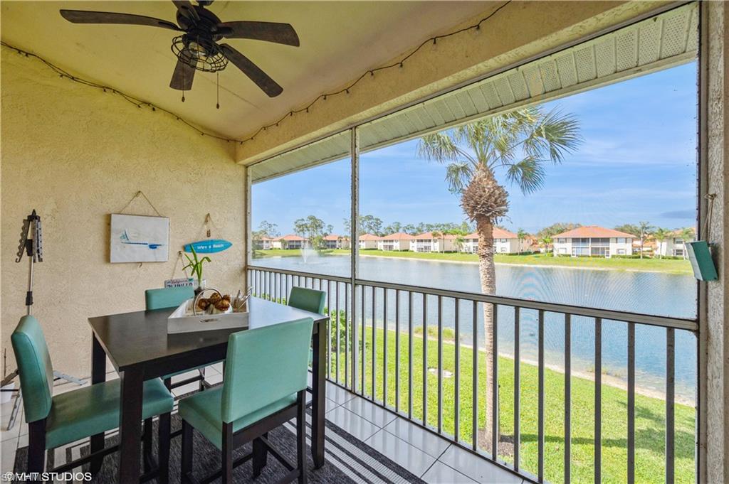 290 Robin Hood Circle, Unit 202 Naples, FL 34104 - Photo 5 of 38 a view of a dining room with furniture window and outside view