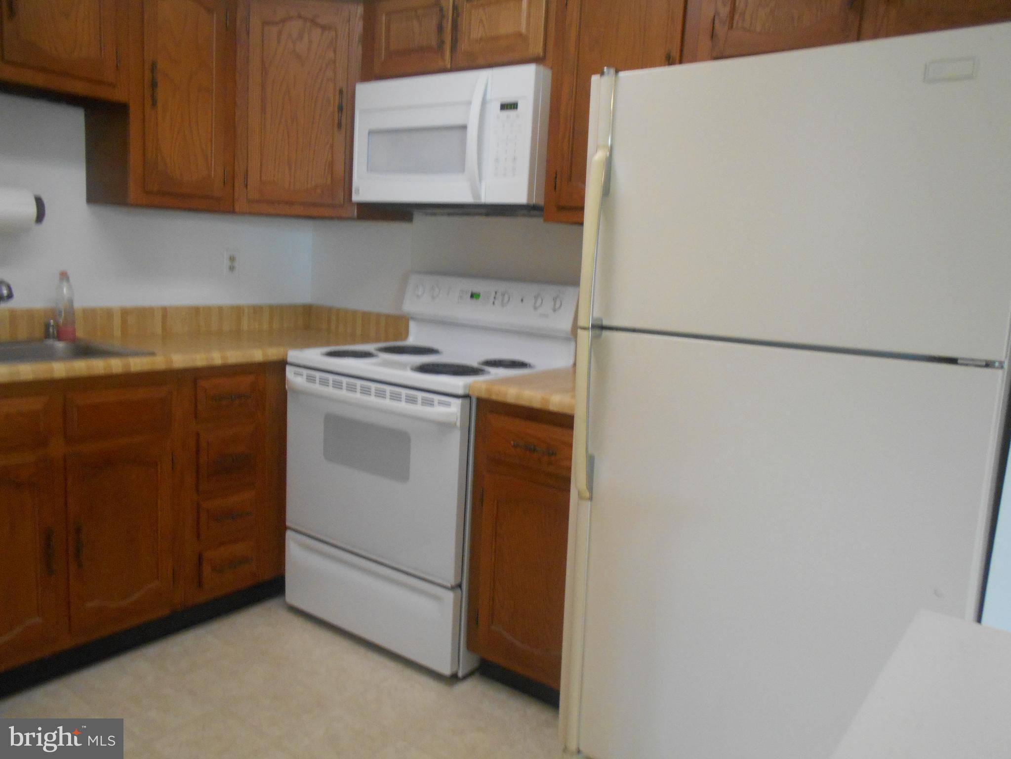 6992 Basswood Road, Unit B Frederick, MD 21703 - Photo 12 of 19 Kitchen WITH BUILT IN MICROWAVE