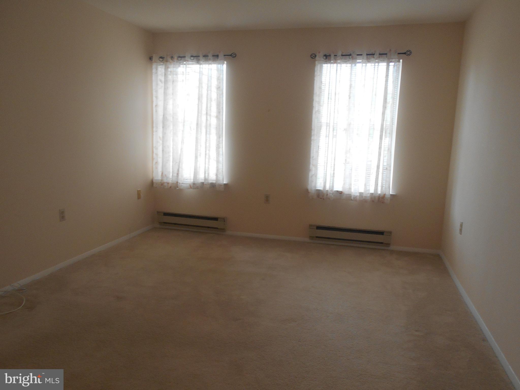 6992 Basswood Road, Unit B Frederick, MD 21703 - Photo 18 of 19 MASTER BEDROOM WITH WALK IN CLOSET
