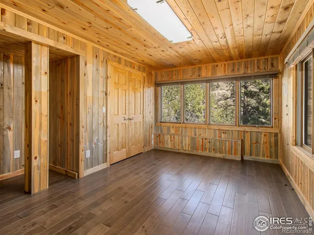 a view of entryway with wooden floor