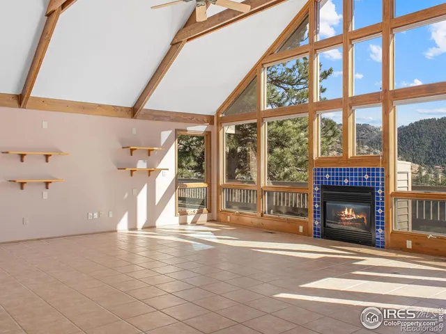 a view of a building with a window and brick walls
