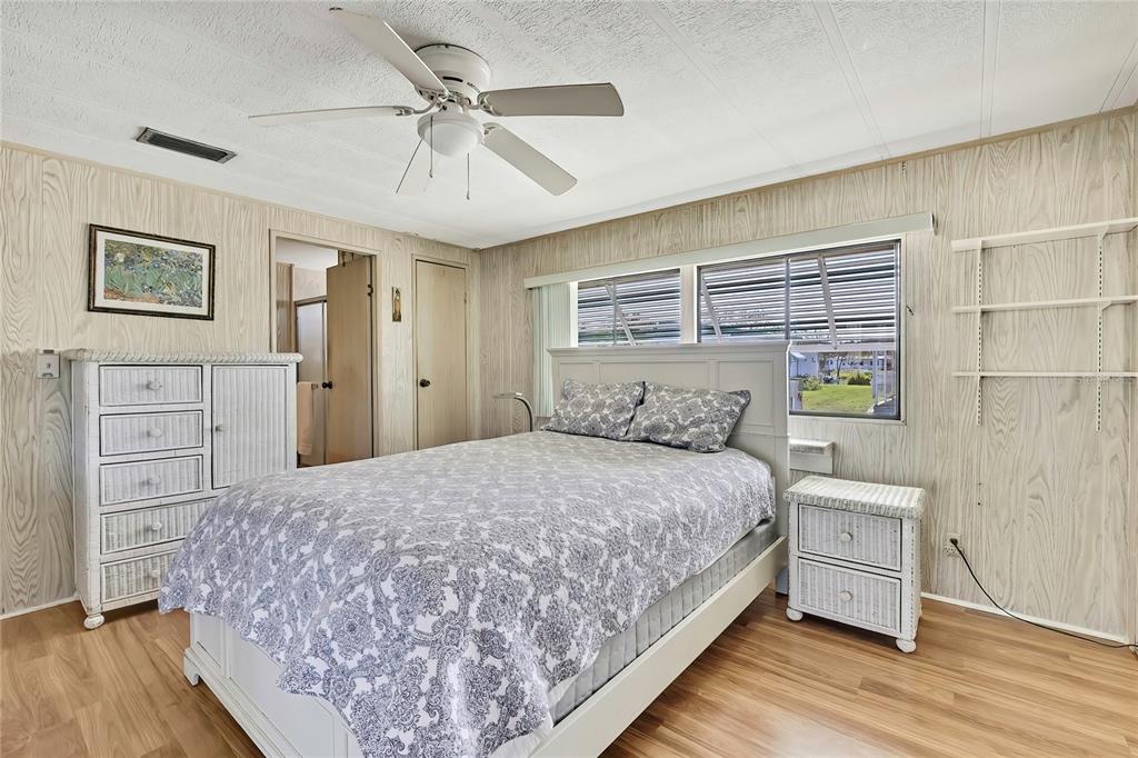 3141 Nantucket Drive Holiday, FL 34690 - Photo 12 of 34 a bedroom with a bed and a window