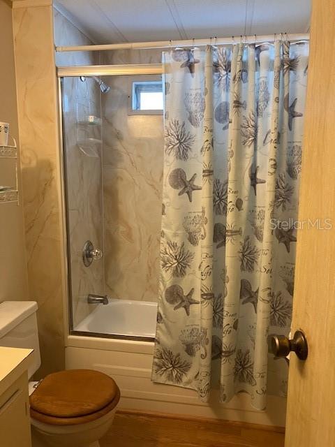 3141 Nantucket Drive Holiday, FL 34690 - Photo 15 of 29 a bathroom with a toilet and shower