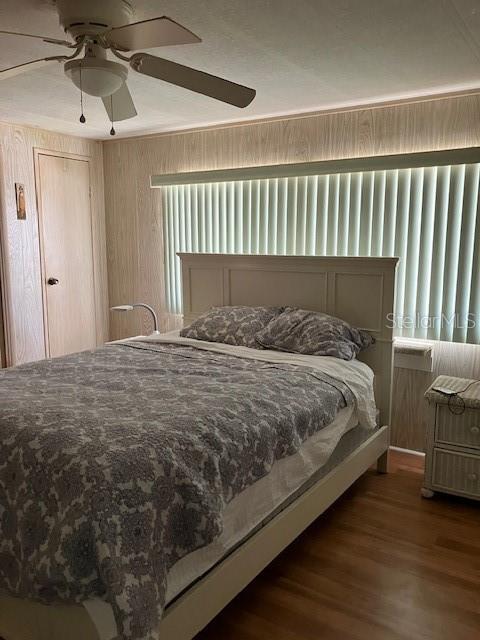 3141 Nantucket Drive Holiday, FL 34690 - Photo 19 of 29 a bedroom with a bed and a window